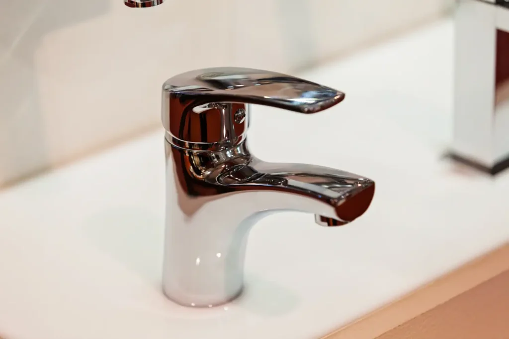 Modern chrome kitchen faucet installed by Mr. Brightside's plumbing team